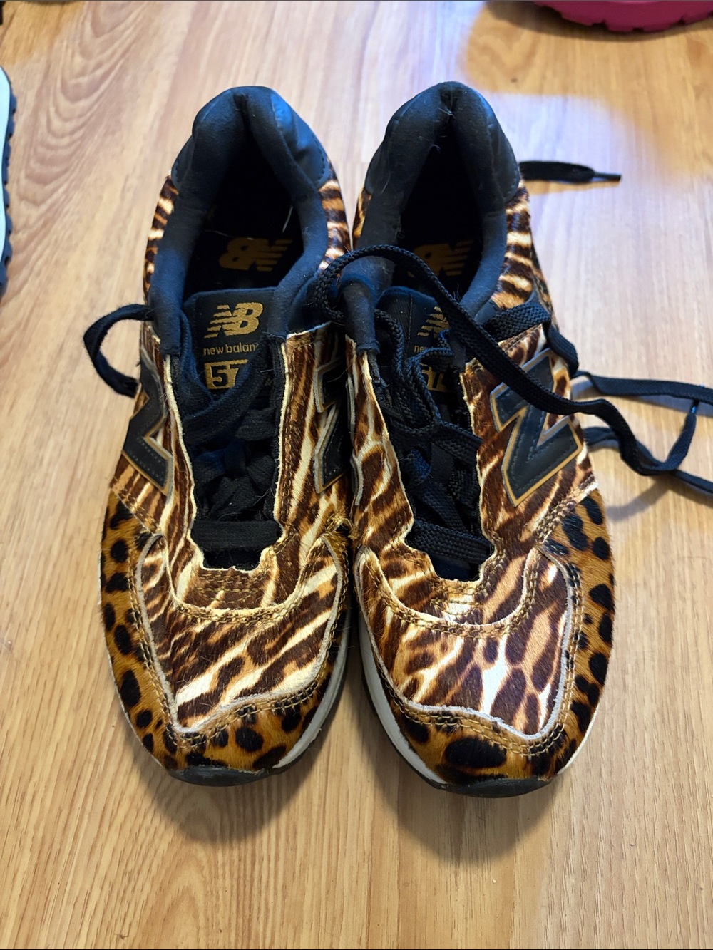 New Balance women’s Leopard-Print Sneakers in Brown and Black